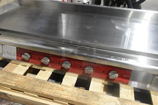 Brand new Avantco stainless steel commercial countertop flat top griddle with thermostatic controls, minor scratches.