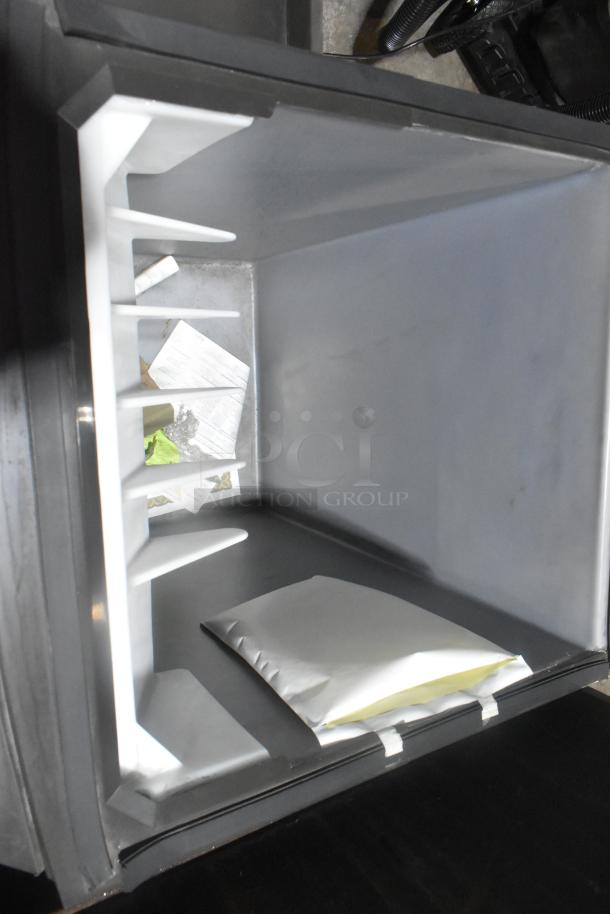 Brand new Manitowoc B320 stainless steel commercial ice bin, scratch and dent condition, spacious interior, model B320.