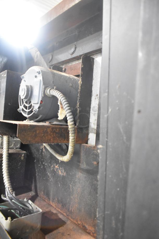 Inside view of a Blodgett stainless steel commercial convection oven, showing motor and wiring. Used condition.