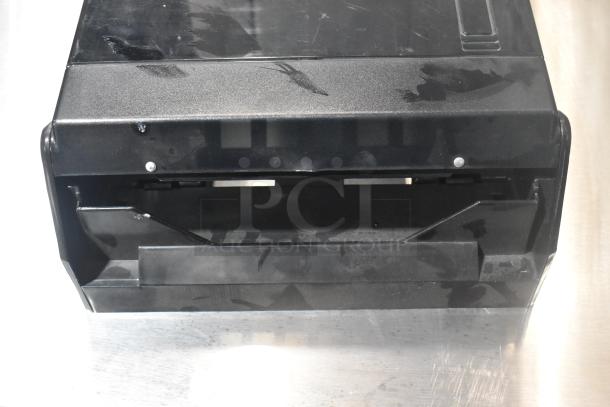 2 Update TD-MFOLD black poly wall mount paper towel dispenser, visible surface wear, suitable for commercial use.