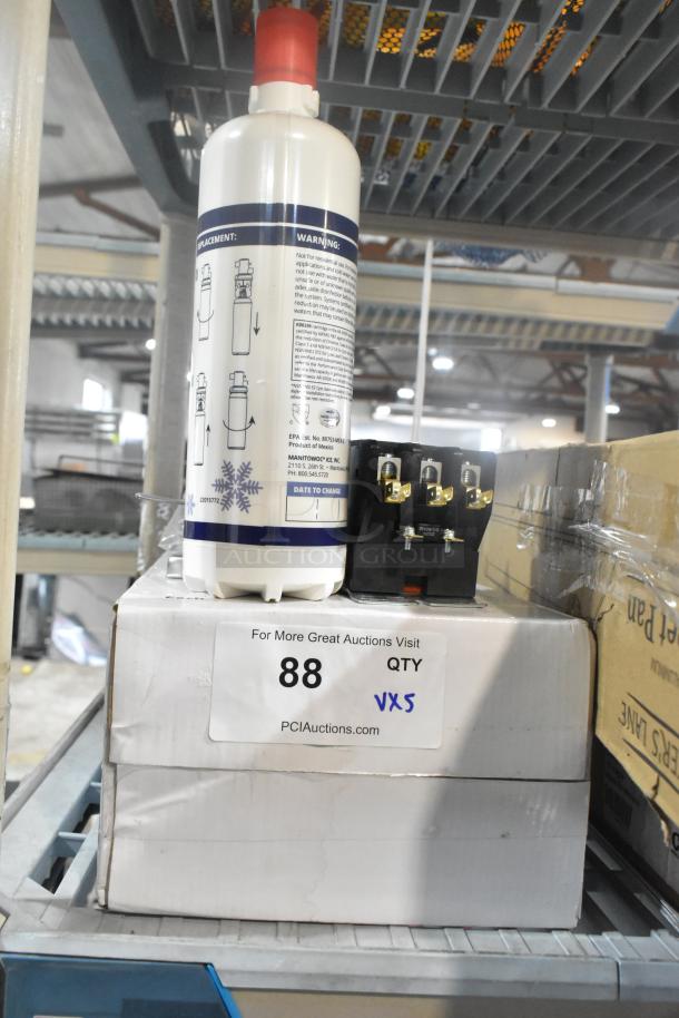 Box of five items including Manitowoc Arctic Pure K0039 cartridge, featuring warning label and installation instructions.