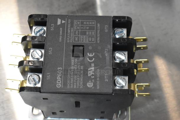 GDP603 Standard Ignition Fuel Pump, black casing, gold connectors, labeled "Made in China." New condition.