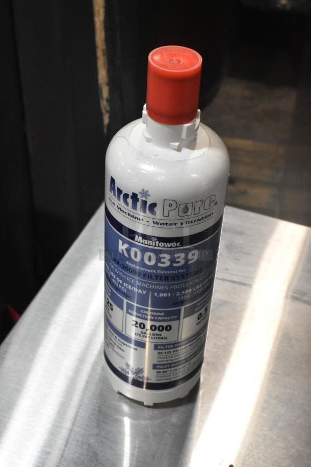 Manitowoc Arctic Pure K0039 water filter cartridge, white and red, labeled for ice machine use, 20,000-gallon capacity.