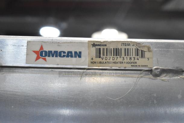 Omcan heated holding cabinet with commercial casters, 115 volts, 1 phase. Label: Non-Insulated Heater Proofer, Made in China.