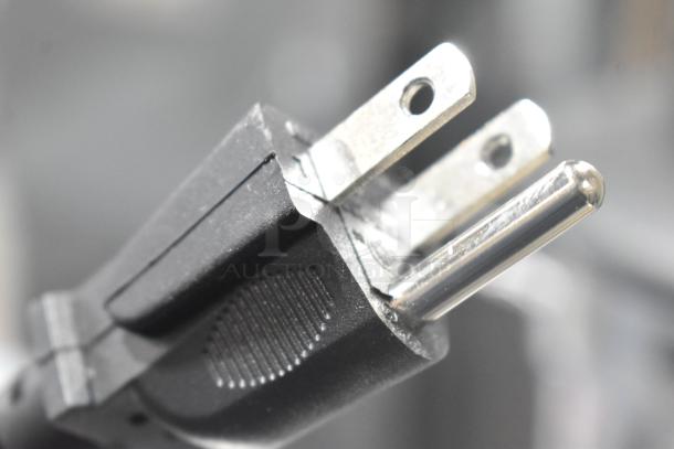Close-up of a plug showing the prongs of the AvaMix 928BL2VS blender.