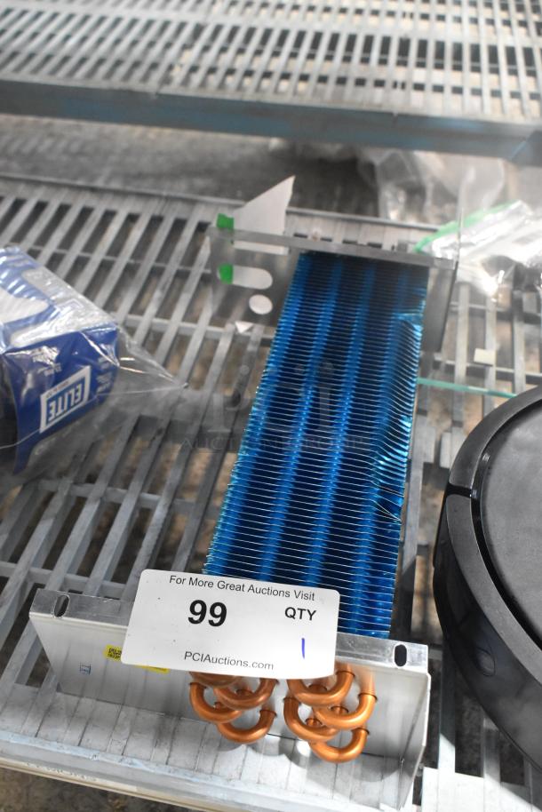 Brand new Avantco 17819443HC evaporator coil for GDC-10-HC, slight scratch and dent, item tag visible.