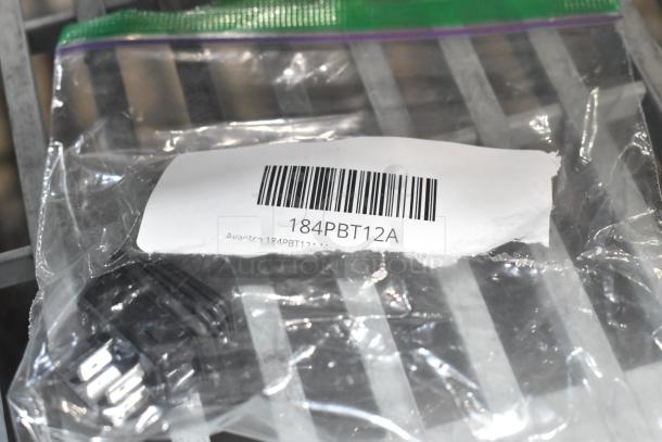 4 brand new scratch and dent items including Avantco master switch 184PBT12A in a clear plastic bag with label.