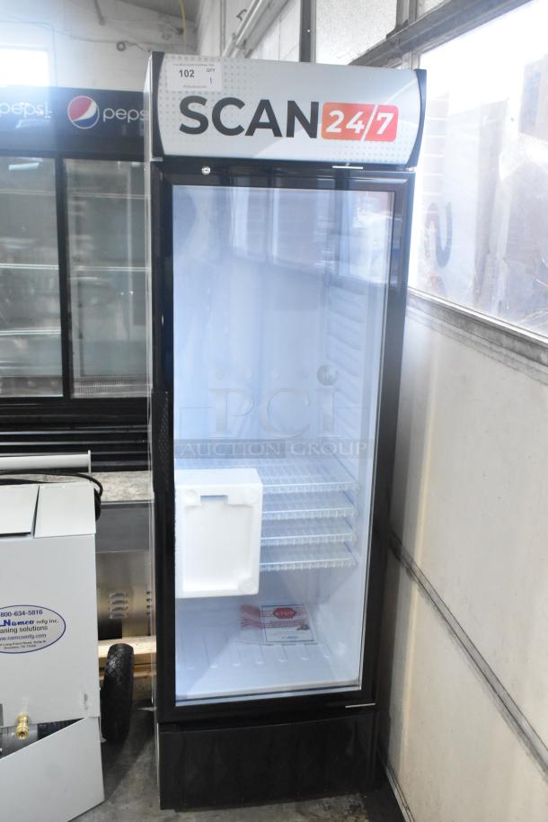 Brand new KoolMore MDR-9CP commercial cooler with visible sign of minor wear, poly-coated racks, single glass door, 115V.