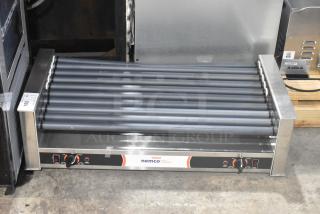 Brand new Nemco 8045SXW-SLT slanted hot dog roller grill, 45-capacity, non-stick coating, 120V, 1 phase, slight scratches.