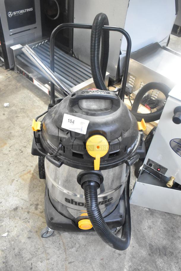 Brand new Shop Vac 92L-C650, wet/dry vacuum, 120V, 1 phase. Visible scratch and dent, model label present.