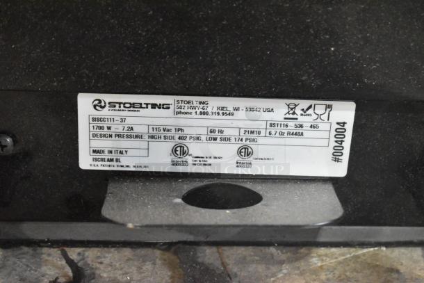 Label on new Stoelting C111-37 soft serve machine; 115V, 1 Phase, made in Italy. ETL certified with design pressure details.