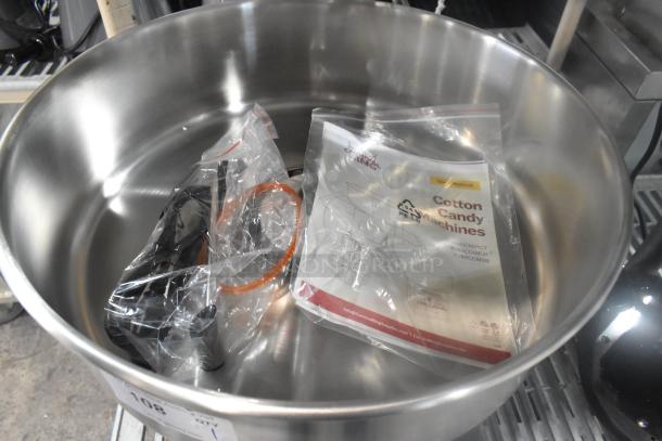 Brand new Carnival King 382CCME21 cotton candy machine with 21" stainless steel bowl, 110V, in sealed packaging.