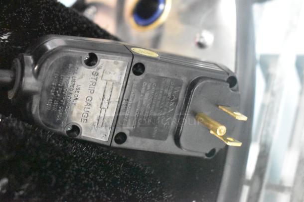 Brand new Noble 274LCNBGW electric glass washer plug, showing 120V, 1-phase specification on label.