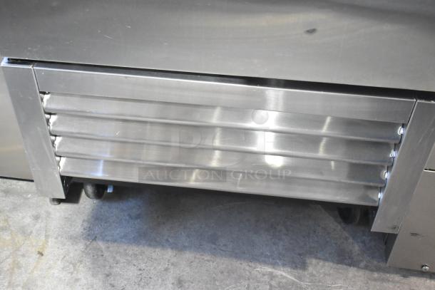 2023 True T-23F-HC stainless steel reach-in freezer with poly-coated racks and commercial casters. 115 volts, 1 phase.