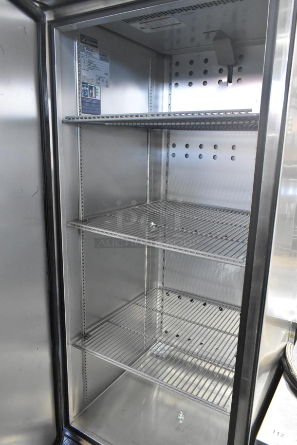 2023 True T-23F-HC stainless steel reach-in freezer, poly-coated racks, on casters. Model details on interior label.