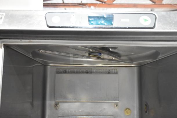 2020 Hobart LXER stainless steel undercounter dishwasher, interior view. Features a top spray arm. Good condition.
