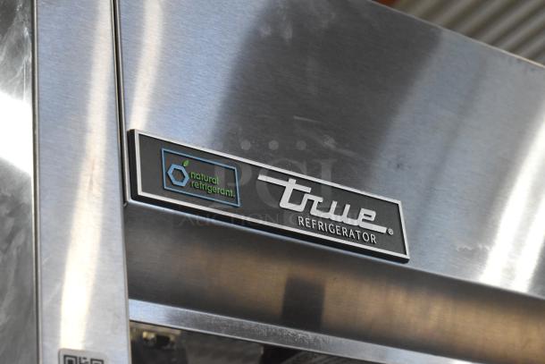 2022 True TG2R-2S-HC Stainless Steel 2 Door Reach-In Cooler, natural refrigerant label visible, 115V, 1 phase.