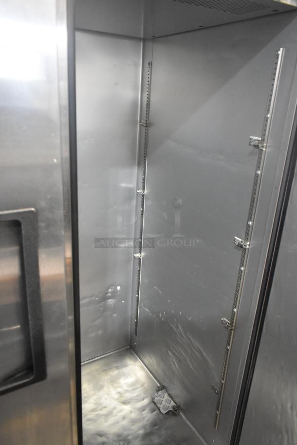 2022 True TG2R-2S-HC stainless steel commercial reach-in cooler, 2-door, 115V, 1 Phase, excellent condition.