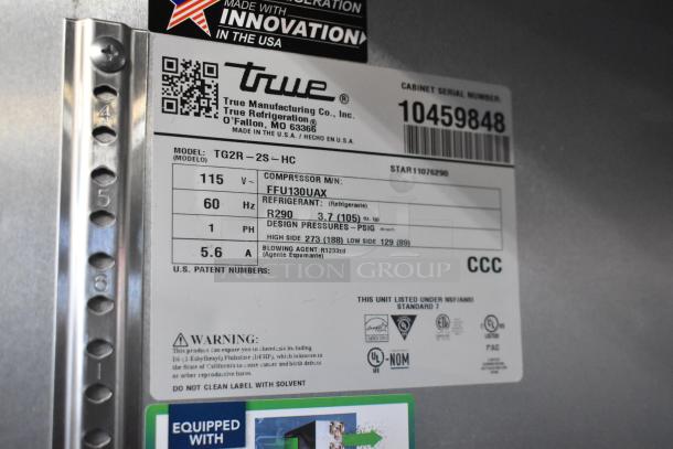 2022 True TG2R-2S-HC stainless steel commercial cooler label. Model TG2R-2S-HC, 115V, 1 Phase, R290 refrigerant. Serial 10459848.