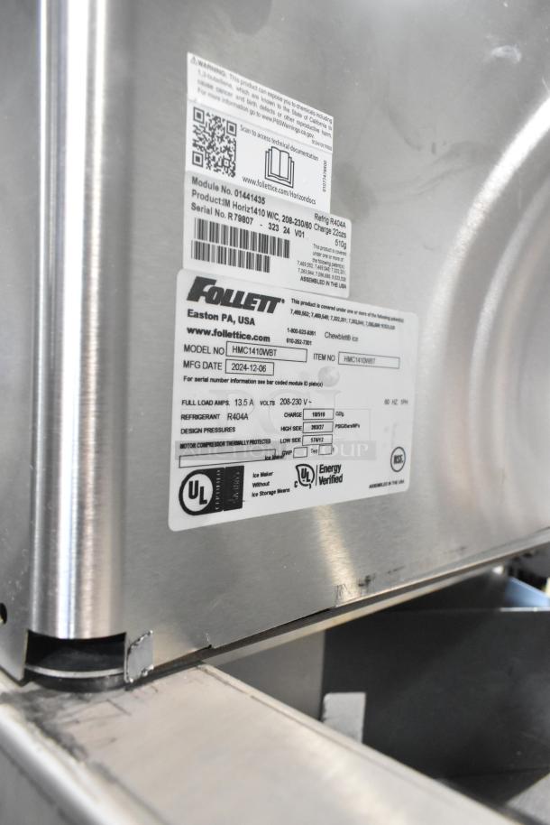 2024 Follett HMC1410WBT stainless steel ice machine on Ice-O-Matic bin, 208-230V, 1 Phase. Labels show model details.