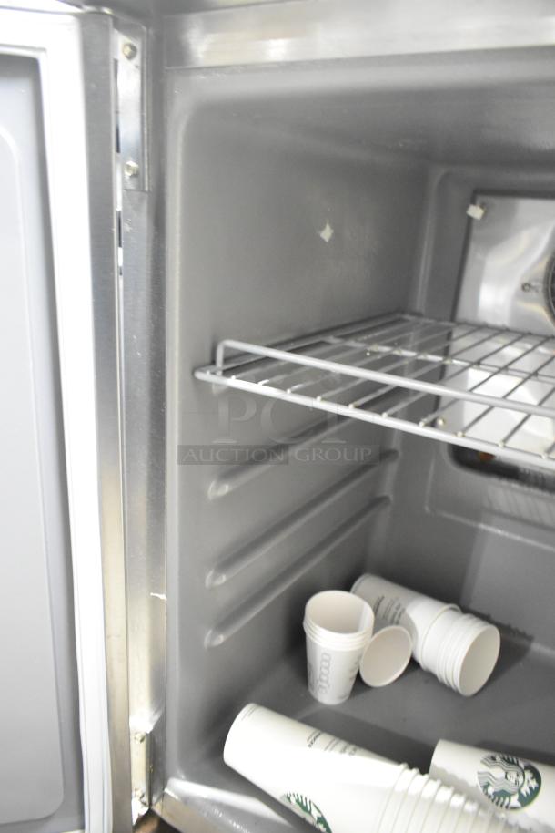 2020 Delfield stainless steel single-door undercounter cooler, commercial casters, 115V, like new condition.