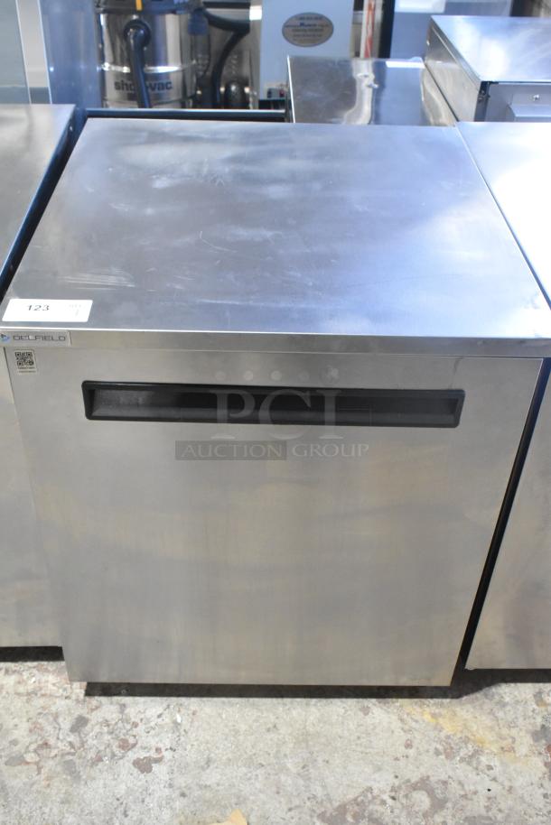 2020 Delfield 406P-STAR2 stainless steel undercounter cooler on casters. Single door, 115V, 1 phase. Model and brand labels visible.