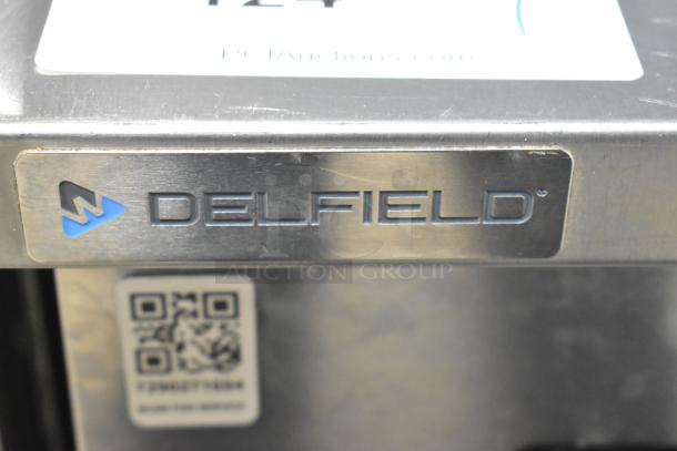 2020 Delfield 406P-STAR2 stainless steel undercounter cooler on casters, 115V, single phase, branded plate visible.