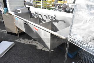 Stainless Steel 3 Bay Sink w/ Right Side Drain Board, 2 Faucets and Handles. - Item #1224000