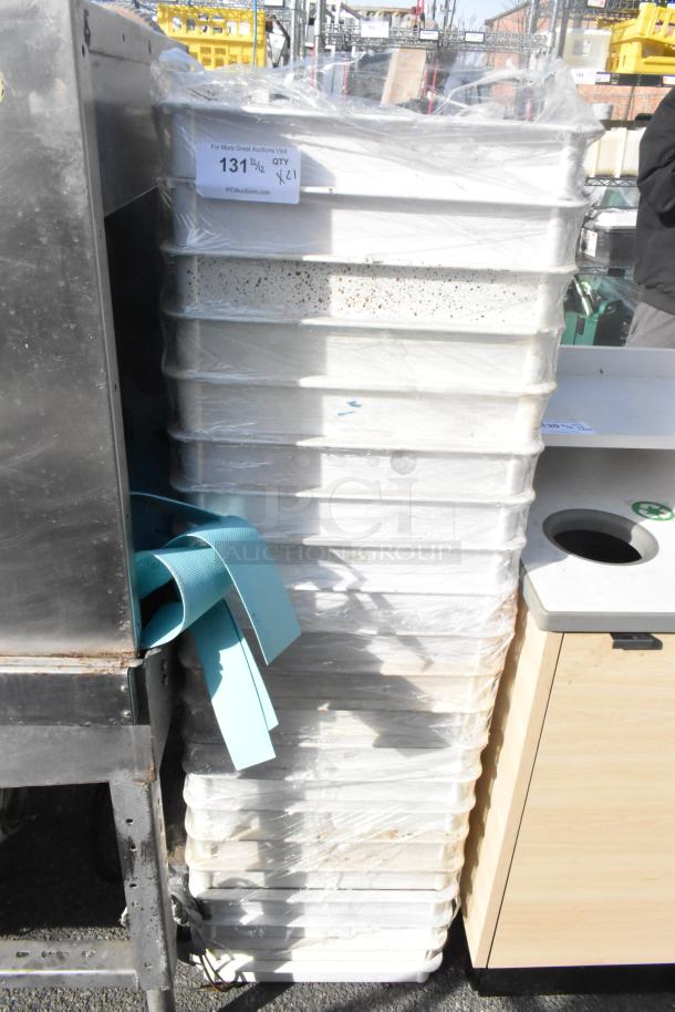 Stack of 21 white poly dough bins, wrapped for storage, slight discoloration visible. Includes lot label with quantity info.