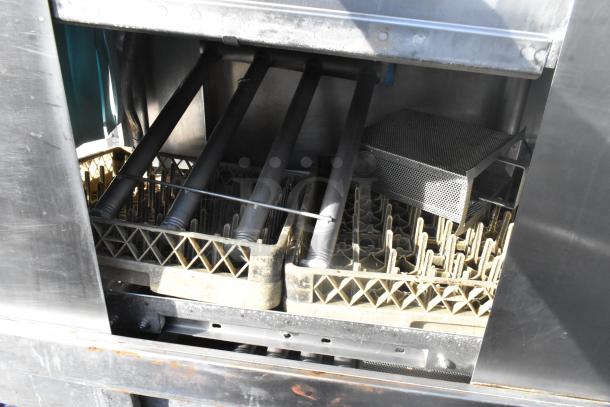 Hobart C44A stainless steel commercial conveyor dishwasher; interior view, 208 volts, 3 phase, used condition.