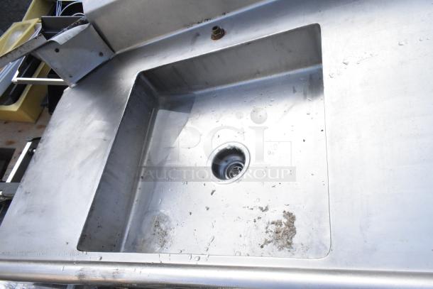 Stainless steel L-shaped right side dirty side dishwasher table with integrated sink, minor wear visible, ideal for commercial kitchens.