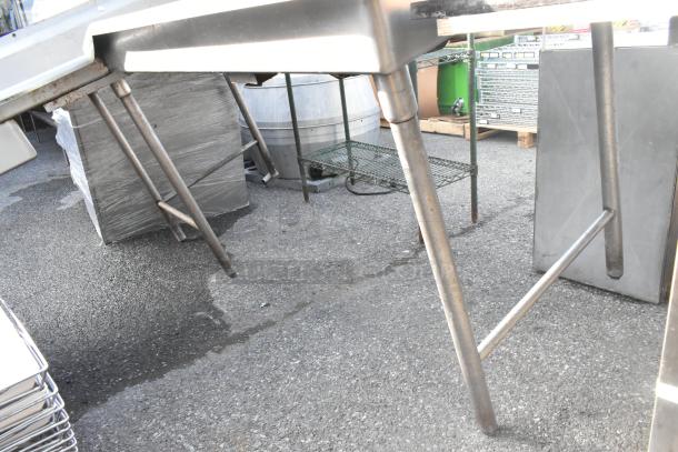 Stainless steel L-shaped dishwasher table, right side dirty side, industrial design, showing sturdy legs and durable construction.