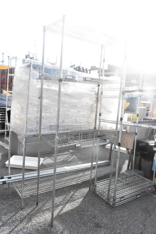 Chrome 2-tier wire shelving unit, bright finish, sturdy construction, buyer must dismantle, freight charges apply.