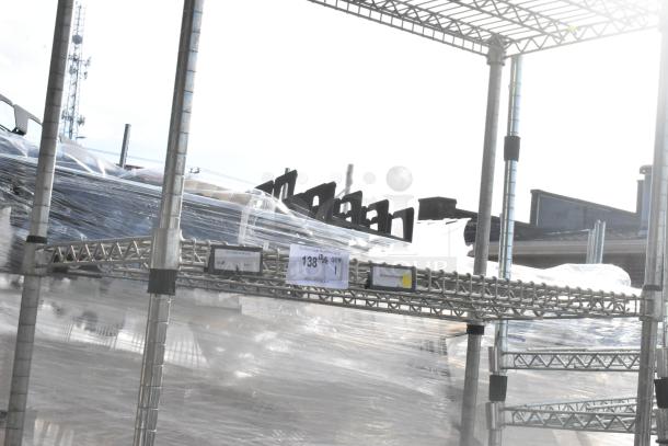 Chrome finish 2-tier wire shelving unit, industrial style, visible signs of use, buyer must dismantle, freight required.