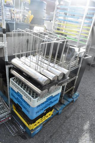 Pallet lot with dish caddies, cup dispenser dolly, and metal rack in used condition. Includes various catering items.