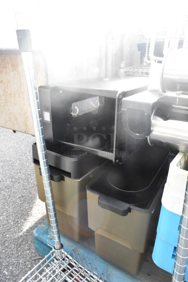 Pallet lot of various items including dish caddies, cup dispenser dolly, and metal rack in used condition.