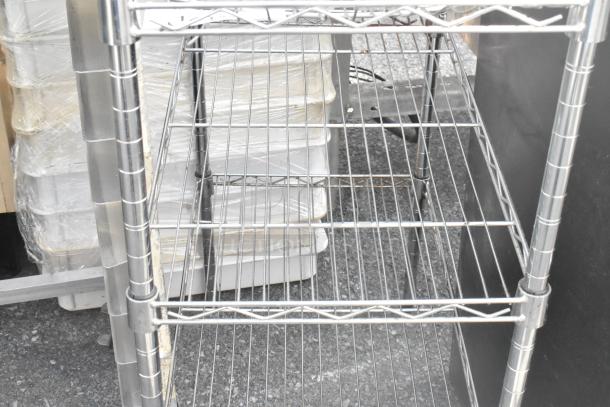 Chrome finish 3-tier wire shelving unit, adjustable shelves. Buyer must dismantle. Consider freight charges.