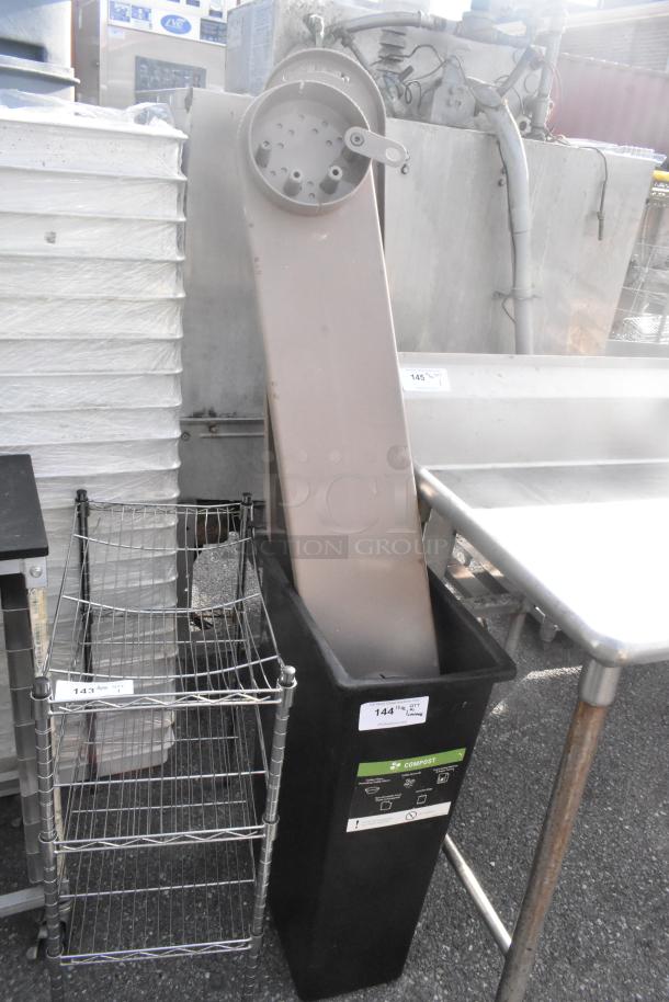 Black Poly Slim Jim Trash Can with contents, used condition. Compost label visible. Includes attached pieces.