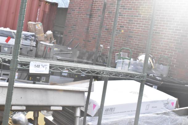 Green finish 4-tier wire shelving unit, sturdy design, must dismantle for shipping. Consider freight charges.