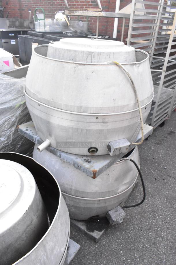 2 ILG metal rooftop mushroom exhaust fans, 115/208V, 1 phase. Used condition, visible wiring and connectors.