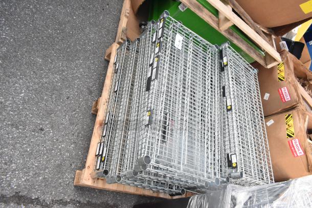 Pallet of chrome finish wire shelves, stacked and labeled, in new condition, ready for auction.
