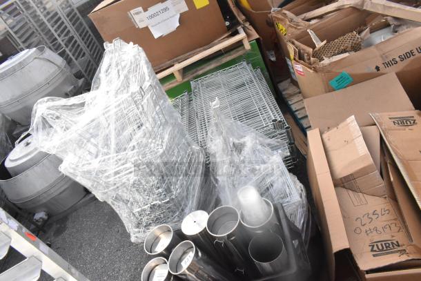 Lot of 3 black poly Slim Jim trash cans with cup dispensers, some cartons, and metal racks on pallets in fair condition.