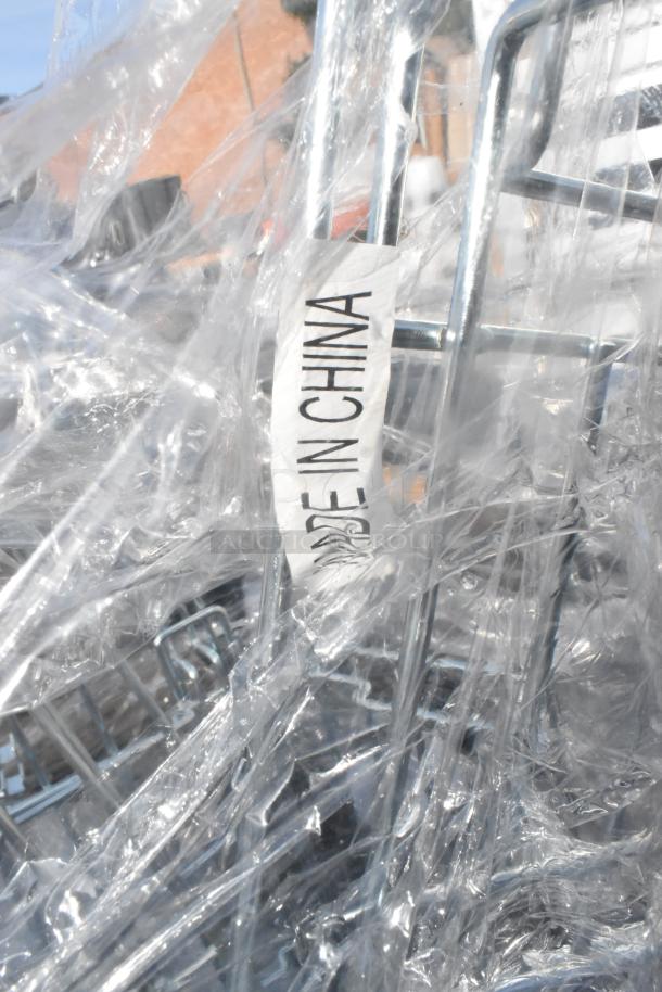 A "Made in China" tag on metal frame wrapped in clear plastic.