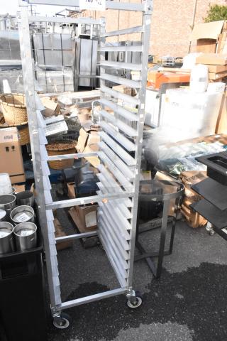 2 metal commercial items: mixing bowl stand and pan transport rack on casters, used condition, auction lot 2 times bid.