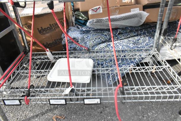 Chrome finish 6-tier wire shelving unit, includes poly bins. Buyer must dismantle. Consider freight charges.