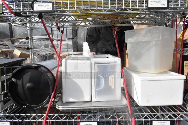 Chrome finish 6-tier wire shelving unit with various poly bins. Includes visible labels. Buyer must dismantle.