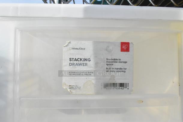 Chrome 5-tier wire shelving unit with contents, including a poly beverage holder dispenser. Includes white stackable drawer with handle. Buyer must dismantle; freight charges apply.