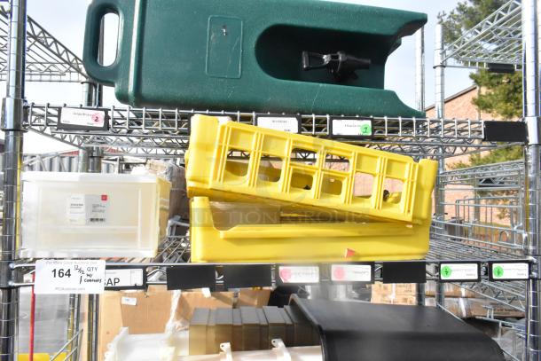 Chrome finish 5-tier wire shelving unit with contents including a poly beverage holder dispenser and yellow crates. Buyer must dismantle.