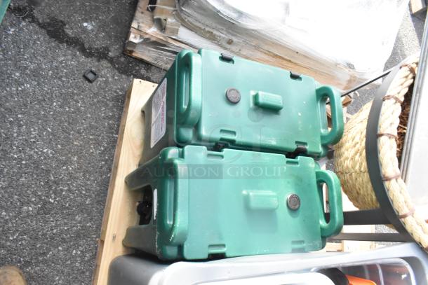Pallet lot with Cambro green beverage dispensers, woven basket on stand, and poly trash cans. Mixed condition.