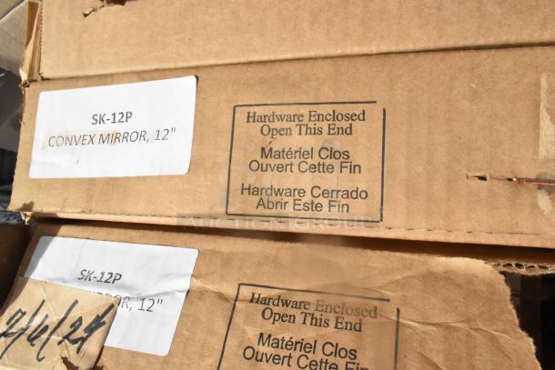 Cardboard boxes labeled "SK-12P Convex Mirror, 12 inch" with hardware enclosure instruction. Auction lot includes 12 items.